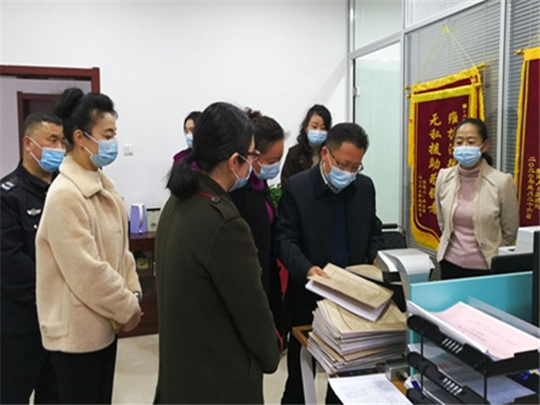 淮南市檢查組評估考核區司法局“兩綱”實施落實情況